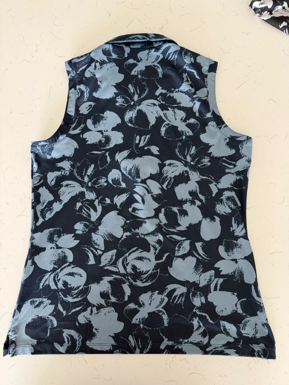 Sleeveless polo in Navy and Light Blue Floral golf/tennis/pickleball - Picture 2 of 3